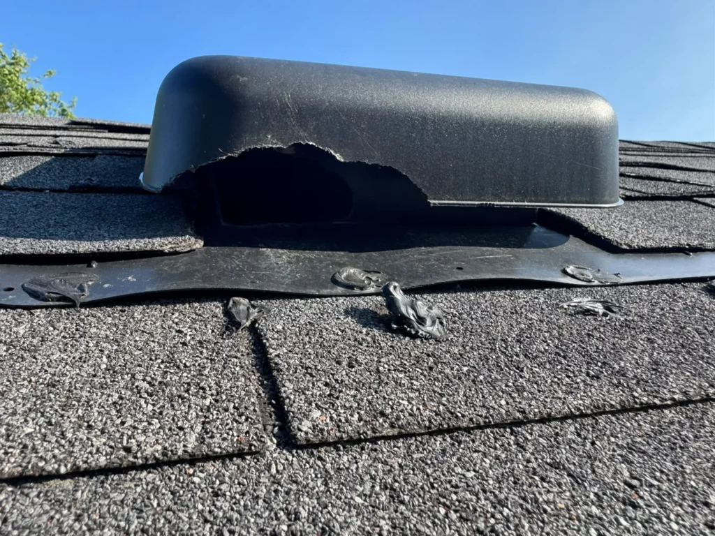Roof vent cover with a large damaged opening before protection.